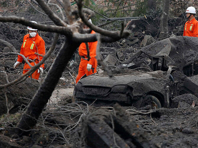 Последствия взрыва нефтепровода в городе Циндао, Китай.. Фото: Фото с сайта www.gazeta.ru