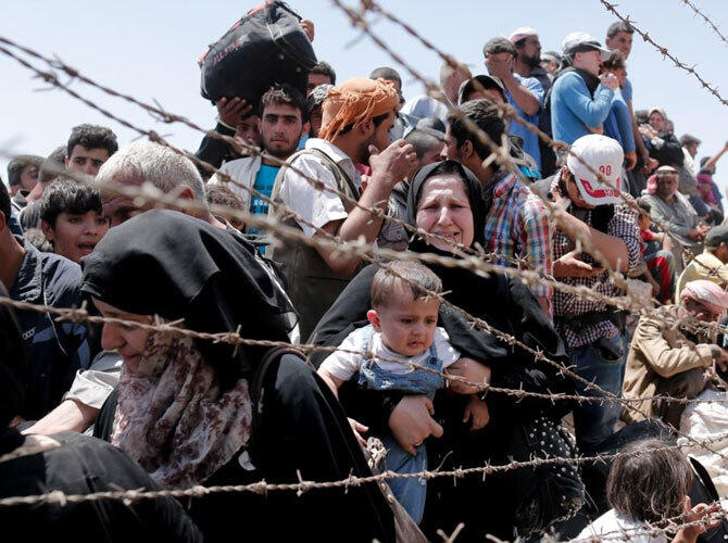 Сирийский конфликт. Фото: Беженцы на границе.
