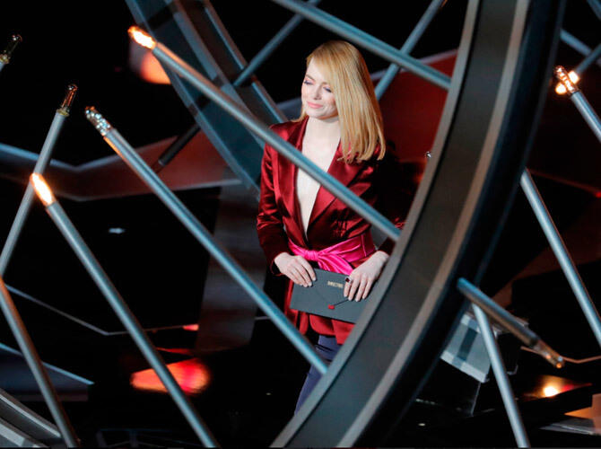 Кому и как вручали «Оскар». Актриса Эмма Стоун во время церемонии вручения кинопремии «Оскар» в Лос-Анджелесе. Фото: www.gazeta.ru