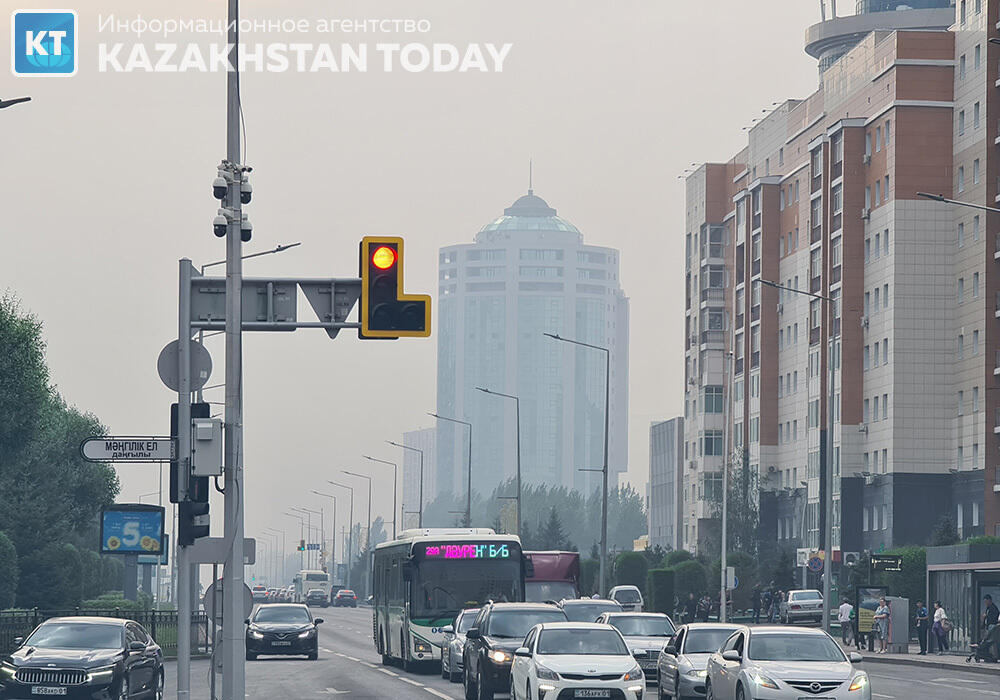 Burning deadwood smoke covered Astana