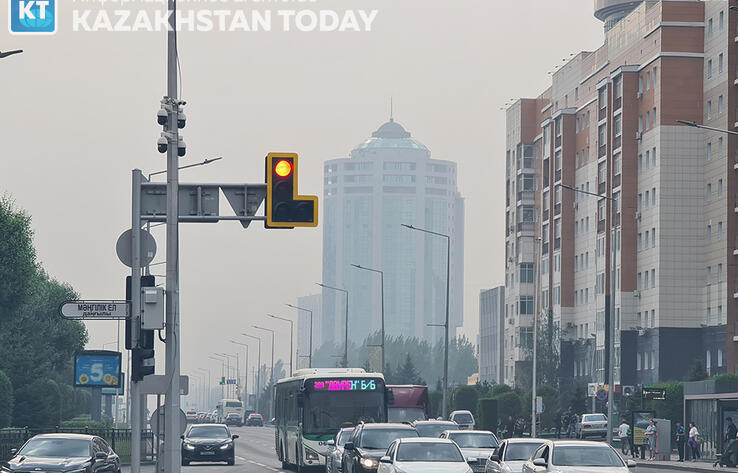 Burning deadwood smoke covered Astana
