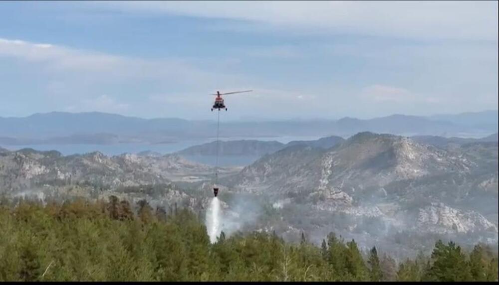 Лесной пожар удалось локализовать с помощью вертолетов в ВКО 