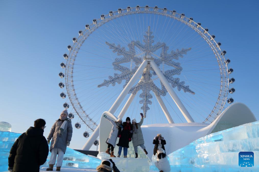 Tourists enjoy New Year holiday at Harbin Ice-Snow World. Images | Xinhua/Wang Jianwei