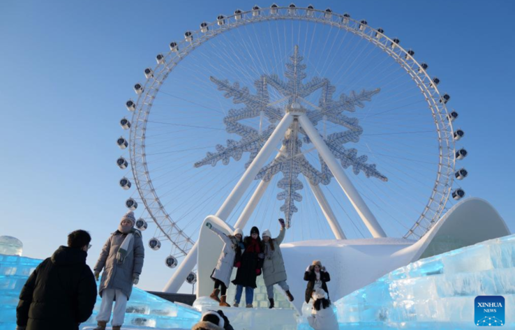 Tourists enjoy New Year holiday at Harbin Ice-Snow World