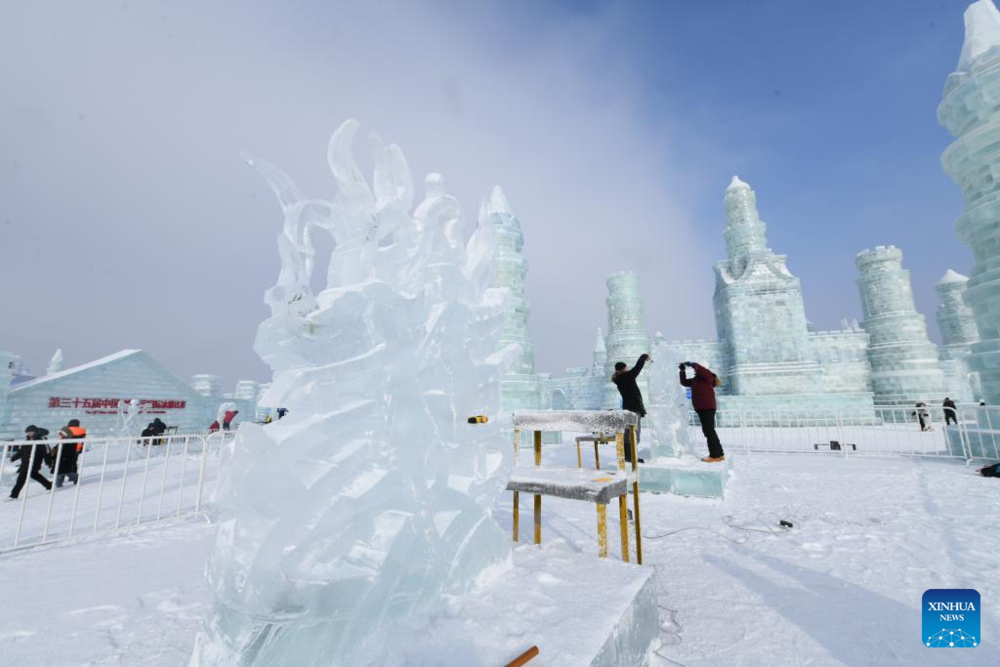 Tourists enjoy New Year holiday at Harbin Ice-Snow World. Images | Xinhua/Wang Song