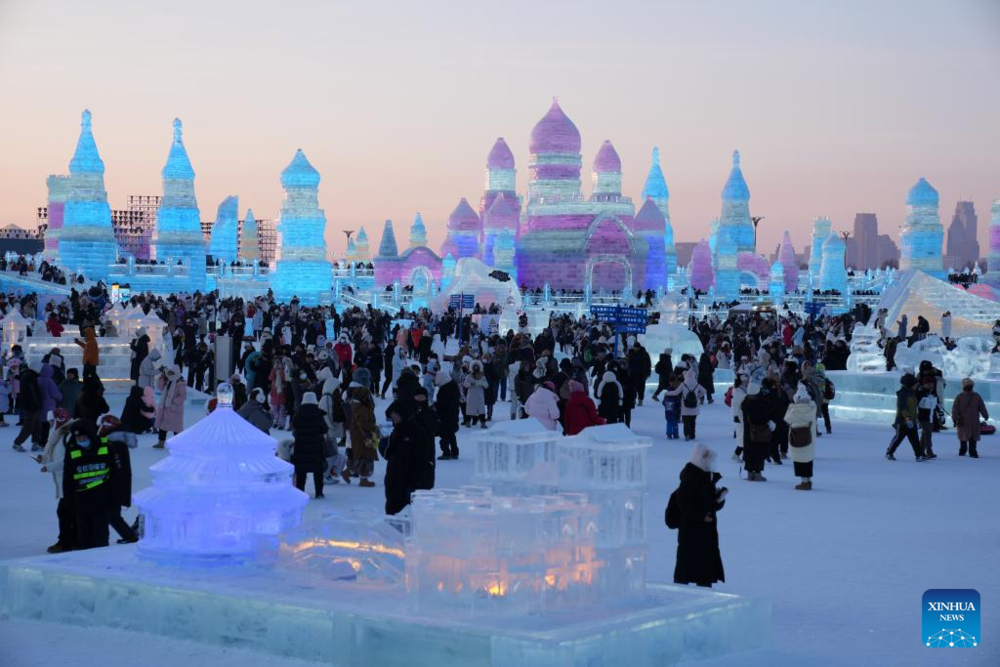 Tourists enjoy New Year holiday at Harbin Ice-Snow World. Images | Xinhua/Wang Jianwei