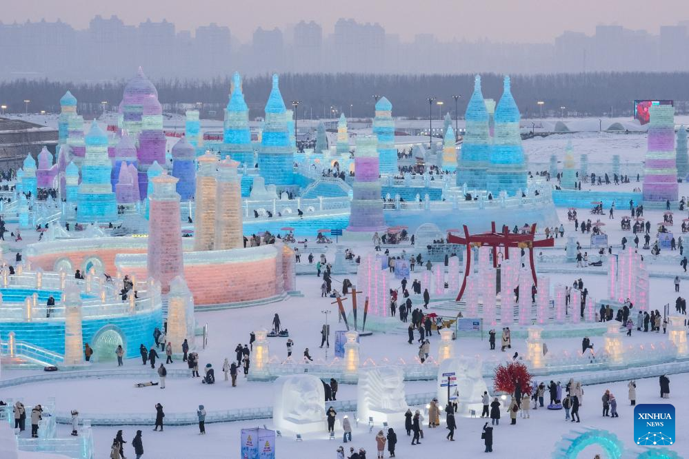 Tourists enjoy New Year holiday at Harbin Ice-Snow World. Images | Xinhua/Xie Jianfei