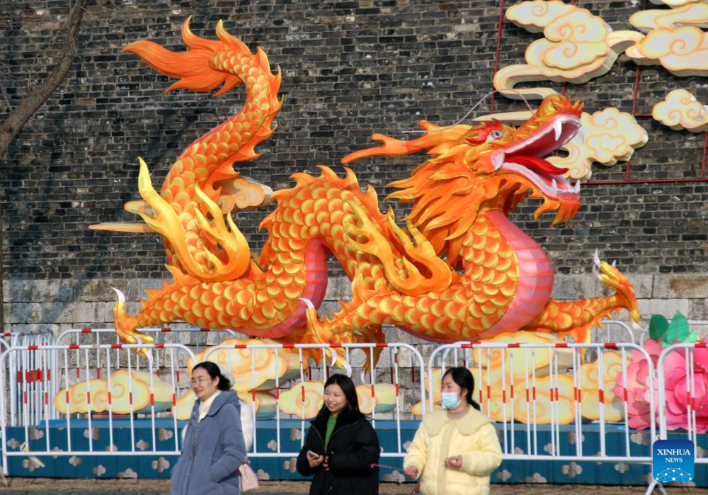 Зеленый дракон и красные фонарики: как отмечают китайский Новый год. Фото: Wang Jiankang/Xinhua