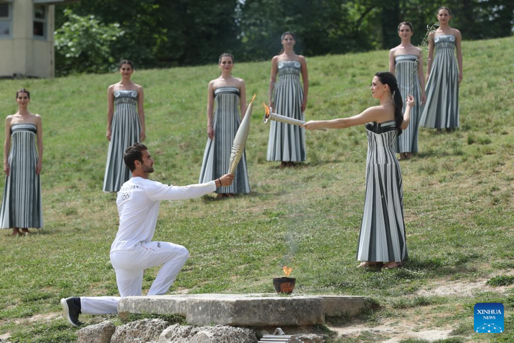 Olympic flame for Paris 2024 Summer Games lit in Ancient Olympia. Images | Xinhua/Zhao Dingzhe