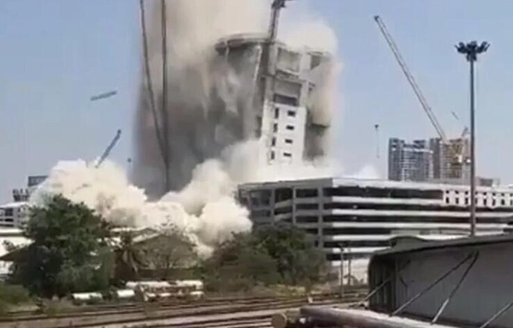 Бангкоктағы зілзала салдарынан көпқабатты үй құлады