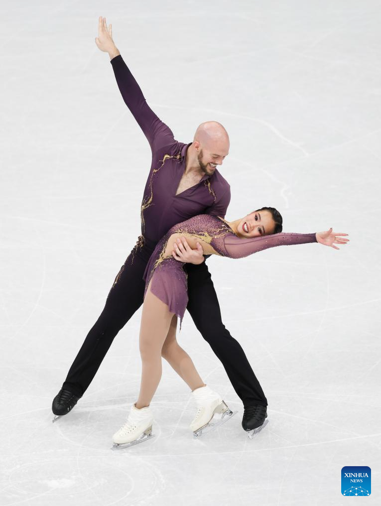Highlights of Milan-Cortina 2026 on Feb. 6. Images | Ellie Kam (R)/Danny O'Shea of the United States compete during the figure skating team event pair skating short program of the Milan-Cortina 2026 Olympic Winter Games in Milan, Italy, Feb. 6, 2026. (Xinhua/Chen Yichen)