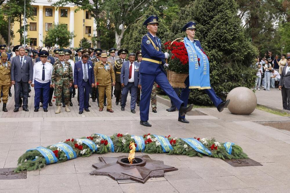 People Gather at the Eternal Flame to Honor WWII Heroes. Images | gov.kz